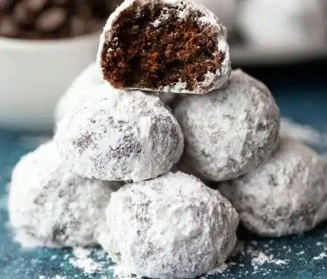 Delicious Chocolate Snowball Cookies dusted with powdered sugar