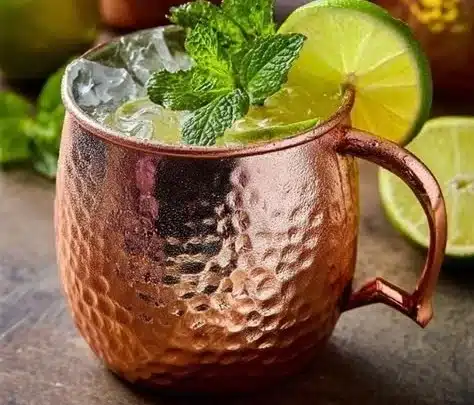 Kentucky Mule 2 Kentucky Mule cocktail with bourbon, ginger beer, and lime garnish.