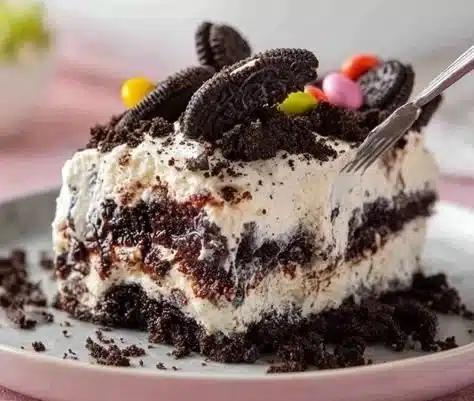 Oreo Dirt Cake 7 Delicious Oreo Dirt Cake layered with creamy filling and crushed Oreos on top.